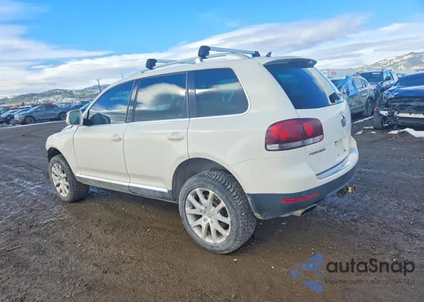 2008 Volkswagen Touareg 2 V8 z USA, uszkodzony, nr VIN WVGCB77L08D041048